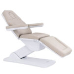eros treatment bed latte front view with raised backrest and insert plug